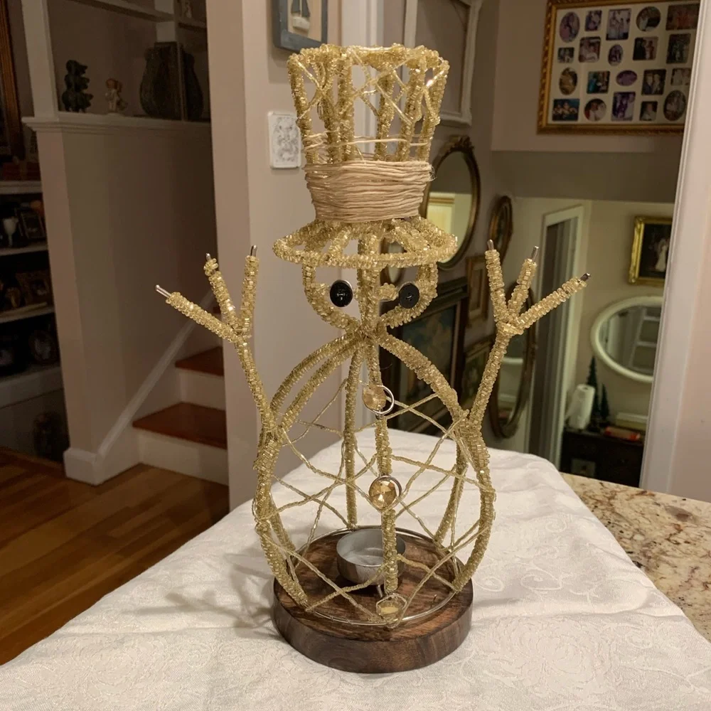 Snowman candle holder with wood base